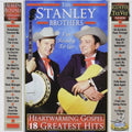 the album cover for Stanley Brothers - Heartwarming Gospel: 18 Greatest Hits