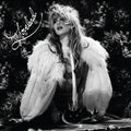 the album cover for Suki Waterhouse - Loveland [Red LP/Poster]