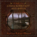 the album cover for Linda Ronstadt & Ann Savoy - Adieu False Heart - 20th Anniversary [HighTone Records]