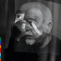 the album cover for Peter Gabriel - o\i [Dark-Side Mix Black]