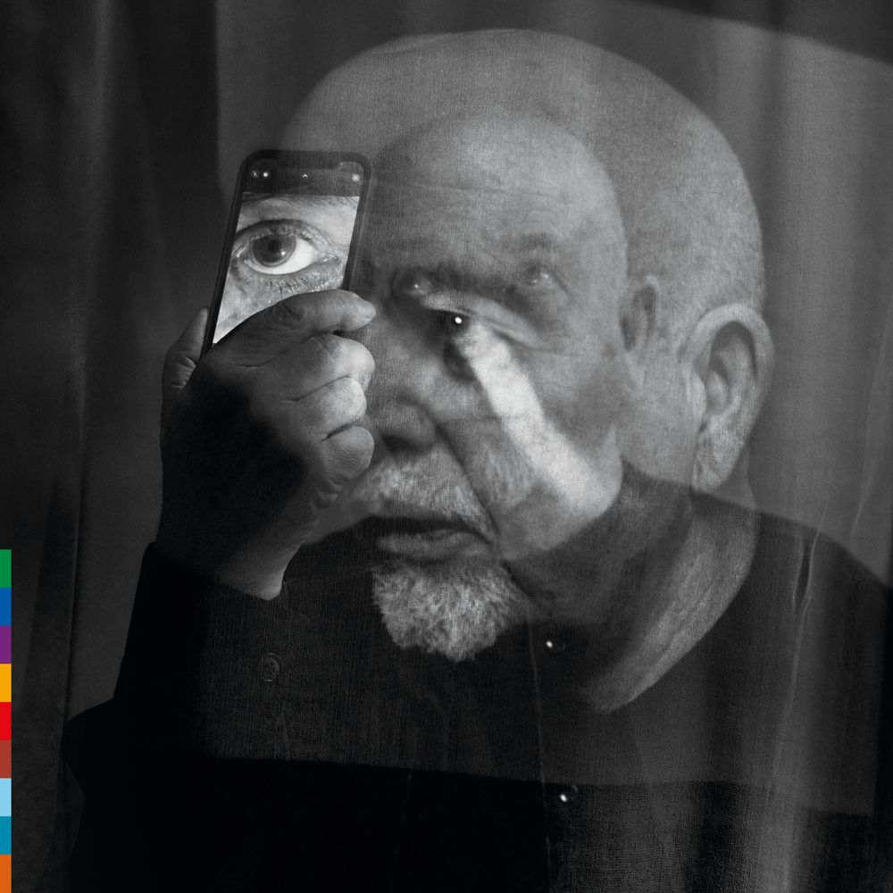 the album cover for Peter Gabriel - o\i [Dark-Side Mix Black]