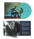 the album cover for Shawn Mendes - Illuminate - 10th Anniversary Edition [Translucent Aqua 2 LP]