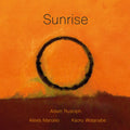 the album cover for Adam Rudolph - Sunrise