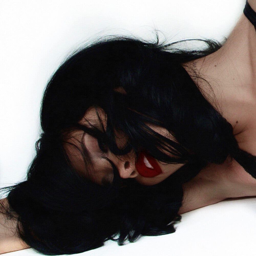 the album cover for Nessa Barrett - Tough Love [Bleeding Heart Red &amp; Black]